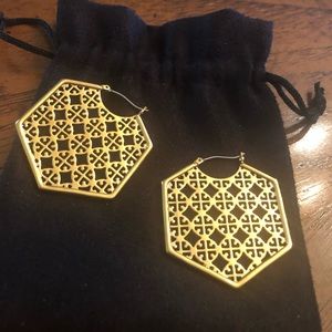 Classy earring from Tory Burch to you.